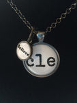 This CLE, Ohio necklace is a one inch pendant with a 12mm dangle charm.